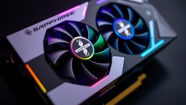 Sapphire Nitro Pulse AM5 Motherboards: Your Ultimate Upgrade? A close-up shot of a Sapphire Nitro+ graphics card, showcasing its distinctive cooling design and RGB lighting.