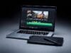 Laptops for Video Editing: Ultimate Showdown for Creators A sleek, open laptop displaying video editing software on screen, with a graphics tablet and stylus beside it. The screen shows a timeline with multiple video tracks.