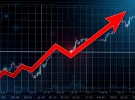 A stock market chart showing a downward trend with a red arrow pointing to a sharp decline.
