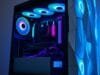PC Modding Community: Unleashing Limitless Creativity & Innovation A stunning, custom-built PC case featuring integrated tempered glass and unique textures, showcasing internal components and custom RGB lighting.