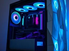 A stunning, custom-built PC case featuring integrated tempered glass and unique textures, showcasing internal components and custom RGB lighting.