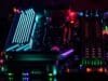 Motherboard Buying Guide: Don’t Buy Until You See This! An engaging image of a high-end motherboard with glowing RGB elements, ready for assembly, showcasing its various ports and slots