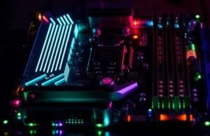 Motherboard Buying Guide: Don’t Buy Until You See This! An engaging image of a high-end motherboard with glowing RGB elements, ready for assembly, showcasing its various ports and slots