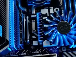 Close-up view of a motherboard's VRM section with large, intricate heatsinks, highlighting robust power delivery components.