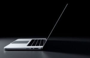 2026 MacBook Pro OLED features: Beyond Retina A side-profile view of a conceptual 2026 MacBook Pro, emphasizing its rumored ultra-thin chassis and sleek, minimalist design, hinting at key 2026 MacBook Pro OLED features.